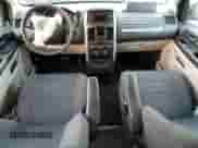 2010 Dodge Grand Caravan SE with VIN 2D4RN4DE4AR379925, listed as a Copart auction lot 84399754 with 198,603 mi miles and Salvage title. Bid and sale history available at DreamBid. Image 8.