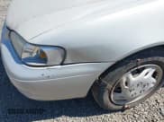 ✅ 1999 Toyota Corolla VE • VIN: 1NXBR12E1XZ259494 • Lot: 43079353. Listed on IAAI with 274,702 mi. Free auction sales archive from the USA and detailed vehicle history report at DreamBid. Image 13.