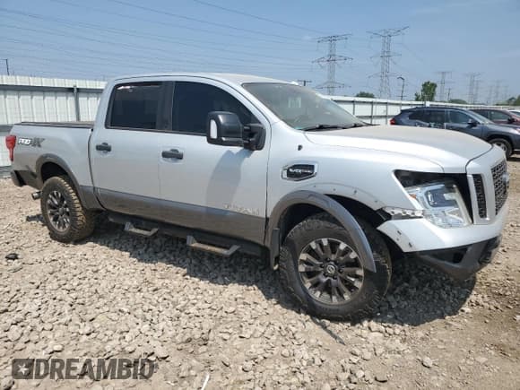 ✅ 2017 Nissan Titan Pro-4X • VIN: 1N6AA1E53HN551661 • Лот: 65382175. Опубликован ранее на Copart с пробегом 158 357 миль. Бесплатный доступ к архиву аукционных продаж из США и подробный отчёт об истории автомобиля на DreamBid. Изображение 4.