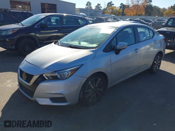 ✅ 2021 Nissan Versa SV • VIN: 3N1CN8EV6ML830527 • Лот: 43697190. Опубликован ранее на IAAI с пробегом 89 884 миль. Бесплатный доступ к архиву аукционных продаж из США и подробный отчёт об истории автомобиля на DreamBid. Изображение 2.