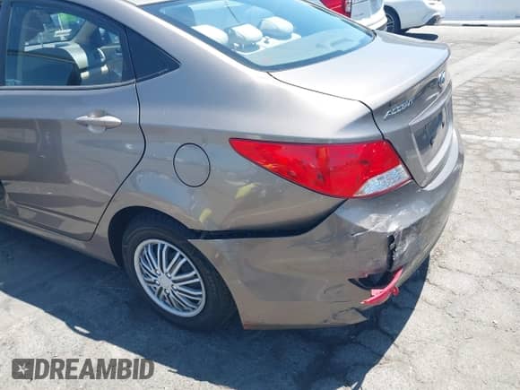 2014 Hyundai Accent GLS with VIN KMHCT4AE8EU655136, listed as a IAAI auction lot 42797016 with 102,554 mi miles and . Bid and sale history available at DreamBid. Image 6.