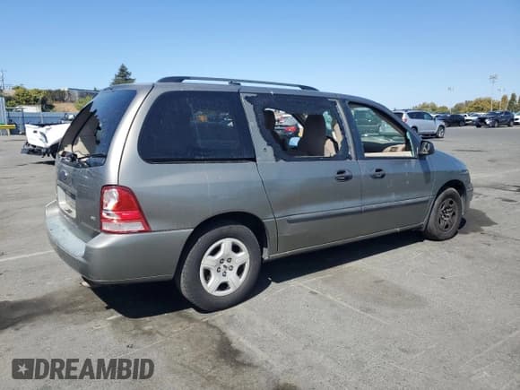 ✅ 2005 Ford Freestar SE • VIN: 2FMDA51695BA24040 • Lot: 81723615. Listed on Copart with Not provided. Free auction sales archive from the USA and detailed vehicle history report at DreamBid. Image 3.