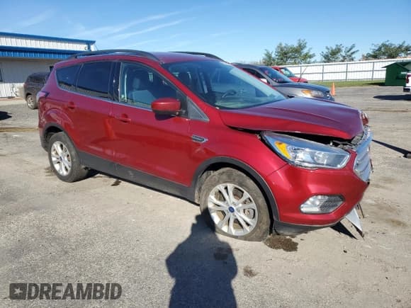 ✅ 2018 Ford Escape SE • VIN: 1FMCU9GD6JUD18905 • Lot: 89444695. Wystawiony na Copart z przebiegiem 120 268 mil. Bezpłatny archiwum sprzedaży aukcyjnych z USA i szczegółowy raport historii pojazdu na DreamBid. Zdjęcie 4.