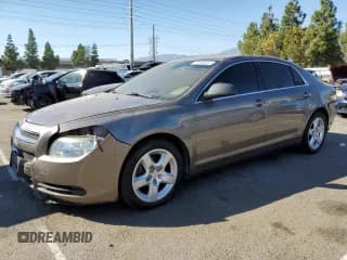 ✅ 2012 Chevrolet Malibu 1LS • VIN: 1G1ZB5E00CF156167 • Lot: 77576674. Listed on Copart with 86,713 mi. Free auction sales archive from the USA and detailed vehicle history report at DreamBid. Image 1.