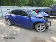 ✅ 2014 Ford Focus Titanium • VIN: 1FADP3J28EL143563 • Lot: 63099755. Listed on Copart with Not provided. Free auction sales archive from the USA and detailed vehicle history report at DreamBid. Image 4.