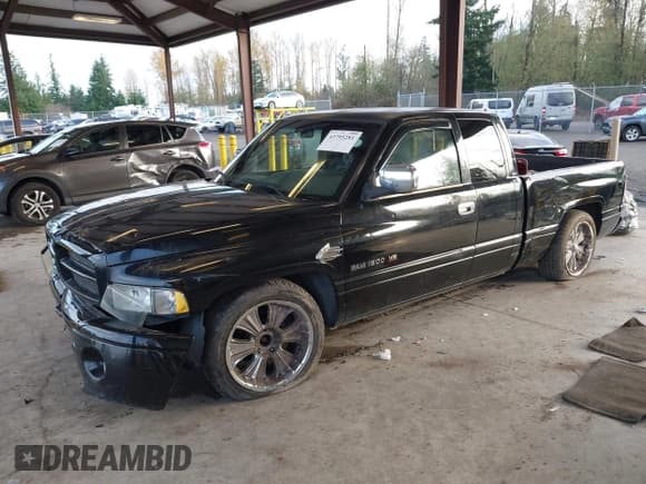 ✅ 2001 Dodge 1500 • VIN: 3B7HC13Y11M541932 • Lot: 43795281. Listed on IAAI with 208,984 mi. Free auction sales archive from the USA and detailed vehicle history report at DreamBid. Image 2.