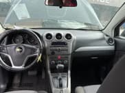 ✅ 2012 Chevrolet Captiva Sport LS • VIN: 3GNAL2EK3CS595366 • Lot: 61148635. Wystawiony na Copart z przebiegiem 208 677 mil. Bezpłatny archiwum sprzedaży aukcyjnych z USA i szczegółowy raport historii pojazdu na DreamBid. Zdjęcie 9.