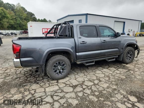 ✅ 2023 Toyota Tacoma SR5 • VIN: 3TMAZ5CN4PM200627 • Лот: 90209385. Опубликован ранее на Copart с пробегом 61 460 миль. Бесплатный доступ к архиву аукционных продаж из США и подробный отчёт об истории автомобиля на DreamBid. Изображение 3.