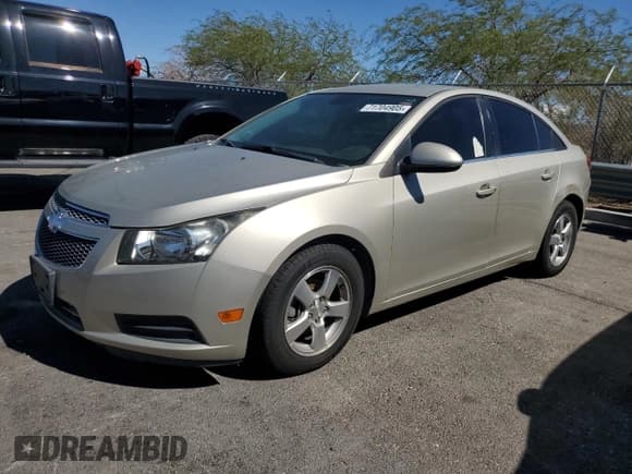 ✅ 2014 Chevrolet Cruze 1LT • VIN: 1G1PC5SB6E7198897 • Lot: 71704905. Listed on Copart with 107,786 mi. Free auction sales archive from the USA and detailed vehicle history report at DreamBid. Image 1.