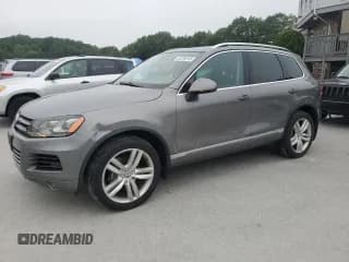 ✅ 2013 Volkswagen Touareg Lux • VIN: WVGEF9BP9DD002651 • Lot: 63206245. Listed on Copart with 186,860 mi. Free auction sales archive from the USA and detailed vehicle history report at DreamBid. Image 1.