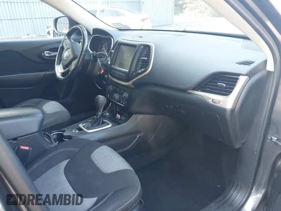 ✅ 2014 Jeep Cherokee Altitude • VIN: 1C4PJMCS8EW153553 • Lot: 42828656. Listed on IAAI with 181,466 mi. Free auction sales archive from the USA and detailed vehicle history report at DreamBid. Image 5.