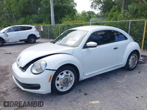 ✅ 2015 Volkswagen Beetle Fleet Edition • VIN: 3VWF17AT2FM656714 • Lot: 42698040. Listed on IAAI with 72,348 mi. Free auction sales archive from the USA and detailed vehicle history report at DreamBid. Image 17.
