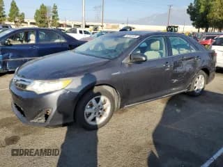 ✅ 2012 Toyota Camry XLE • VIN: 4T1BD1FK5CU055788 • Lot: 82702435. Wystawiony na Copart z przebiegiem 143 152 mil. Bezpłatny archiwum sprzedaży aukcyjnych z USA i szczegółowy raport historii pojazdu na DreamBid. Zdjęcie 1.