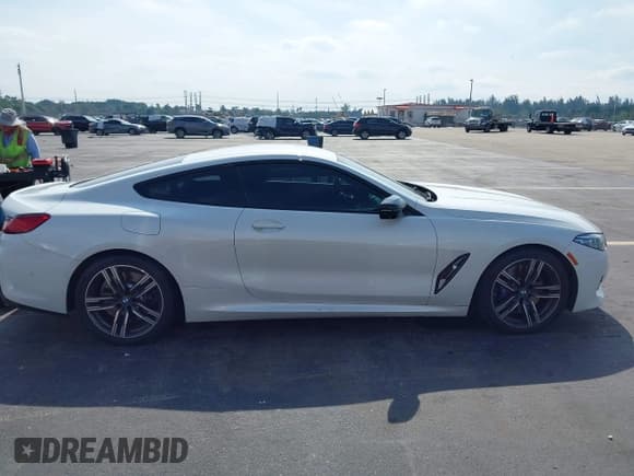 ✅ 2023 BMW 8 Series 840i • VIN: WBAAE2C04PCK62025 • Lot: 43605196. Listed on IAAI with 51,010 mi. Free auction sales archive from the USA and detailed vehicle history report at DreamBid. Image 13.