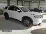 2024 Nissan Pathfinder SV with VIN 5N1DR3BAXRC297459, listed as a Copart auction lot 90979305 with 32,984 mi miles and Clean title. Bid and sale history available at DreamBid. Image 4.