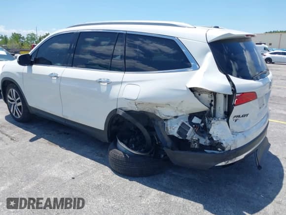 ✅ 2018 Honda Pilot Elite • VIN: 5FNYF6H00JB058623 • Lot: 42323415. Listed on IAAI with 102,015 mi. Free auction sales archive from the USA and detailed vehicle history report at DreamBid. Image 6.