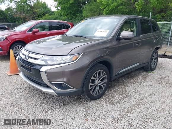 2018 Mitsubishi Outlander SE with VIN JA4AD3A34JZ065816, listed as a IAAI auction lot 42387958 with 201,398 mi miles and . Bid and sale history available at DreamBid. Image 2.