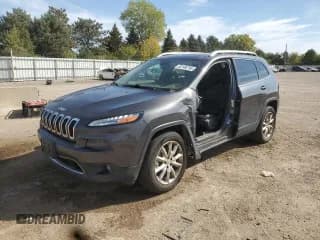✅ 2016 Jeep Cherokee Limited • VIN: 1C4PJMDB1GW133985 • Lot: 82148795. Listed on Copart with 143,114 mi. Free auction sales archive from the USA and detailed vehicle history report at DreamBid. Image 1.