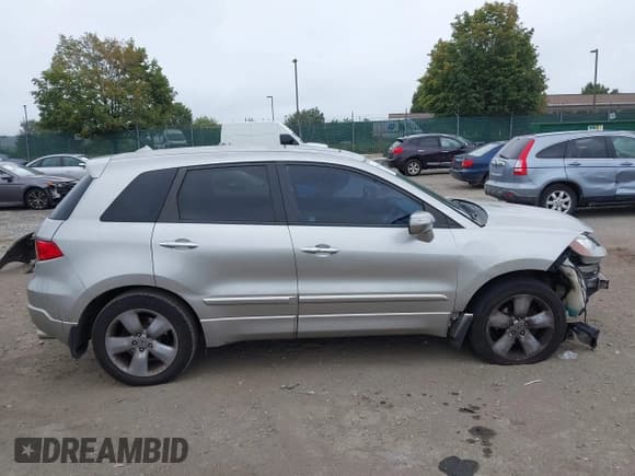 ✅ 2009 Acura RDX Technology • VIN: 5J8TB18569A007802 • Lot: 43193645. Listed on IAAI with 164,034 mi. Free auction sales archive from the USA and detailed vehicle history report at DreamBid. Image 14.