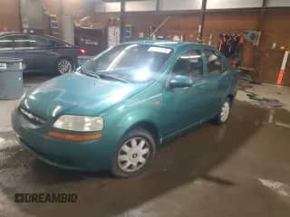 2004 Chevrolet Aveo LS z VIN KL1TJ52604B148255, wystawiony jako Copart lot #52167815 z przebiegiem 67 162 mil mil oraz Czysty tytuł • Clean title. Historia ofert i sprzedaży dostępna na DreamBid. Obrazek 1.