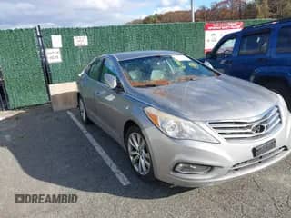 2013 Hyundai Azera with VIN KMHFG4JG3DA329523, listed as a IAAI auction lot 43593562 with 93,702 mi miles and . Bid and sale history available at DreamBid. Image 1.