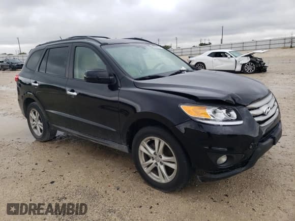 ✅ 2012 Hyundai Santa Fe Limited • VIN: 5XYZK4AG6CG110778 • Lot: 69934314. Listed on Copart with 172,850 mi. Free auction sales archive from the USA and detailed vehicle history report at DreamBid. Image 4.