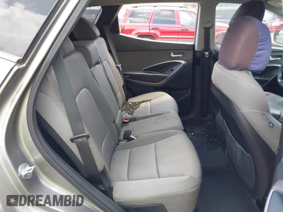 ✅ 2015 Hyundai Santa Fe • VIN: 5XYZUDLB5FG273437 • Лот: 42580624. Опубликован ранее на IAAI с пробегом 92 061 миль. Бесплатный доступ к архиву аукционных продаж из США и подробный отчёт об истории автомобиля на DreamBid. Изображение 8.