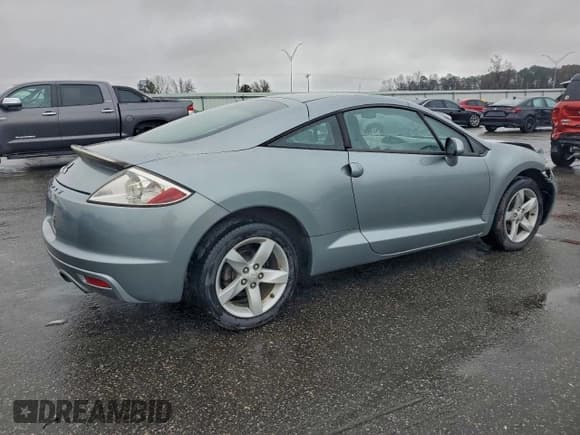 ✅ 2009 Mitsubishi Eclipse GS • VIN: 4A3AK24FX9E012629 • Lot: 94321145. Listed on Copart with 166,637 mi. Free auction sales archive from the USA and detailed vehicle history report at DreamBid. Image 3.