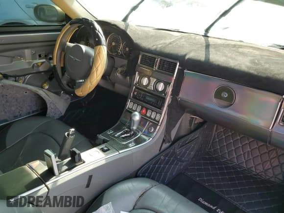 ✅ 2005 Chrysler Crossfire Limited • VIN: 1C3AN69L05X035386 • Лот: 70837984. Опубликован ранее на Copart с пробегом 36 500 миль. Бесплатный доступ к архиву аукционных продаж из США и подробный отчёт об истории автомобиля на DreamBid. Изображение 8.