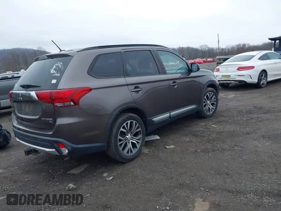 2016 Mitsubishi Outlander SE с VIN JA4AZ3A32GZ057465, выставлен на аукционе IAAI как лот 41963392 с пробегом 94 403 миль миль и . История ставок и продаж доступна на DreamBid. Изображение 4.
