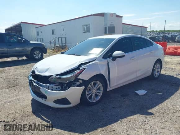 2019 Chevrolet Cruze LT with VIN 1G1BE5SM2K7115242, listed as a IAAI auction lot 43305485 with 77,219 mi miles and . Bid and sale history available at DreamBid. Image 2.