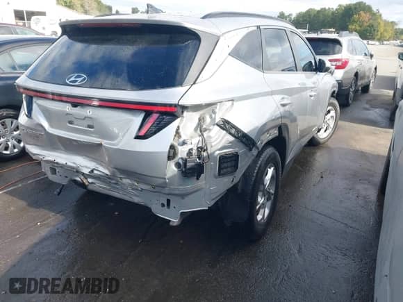 2022 Hyundai Tucson SEL with VIN 5NMJB3AE1NH041500, listed as a IAAI auction lot 43431121 with 37,395 mi miles and . Bid and sale history available at DreamBid. Image 4.