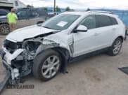 ✅ 2016 Cadillac SRX Premium Collection • VIN: 3GYFNGE32GS505204 • Lot: 42704169. Listed on IAAI with 149,035 mi. Free auction sales archive from the USA and detailed vehicle history report at DreamBid. Image 2.