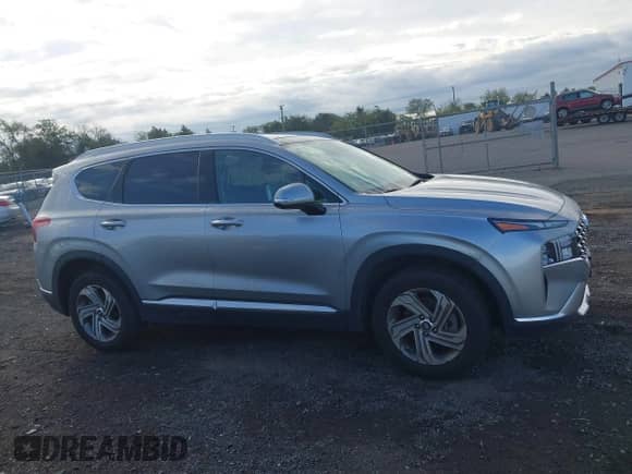 2023 Hyundai Santa Fe SEL with VIN 5NMS34AJXPH524877, listed as a IAAI auction lot 43312881 with 63,983 mi miles and . Bid and sale history available at DreamBid. Image 13.