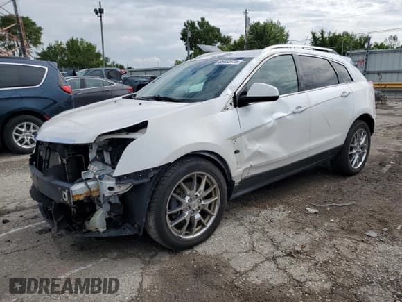 ✅ 2013 Cadillac SRX Performance Collection • VIN: 3GYFNHE36DS521908 • Lot: 65402415. Listed on Copart with 124,799 mi. Free auction sales archive from the USA and detailed vehicle history report at DreamBid. Image 1.