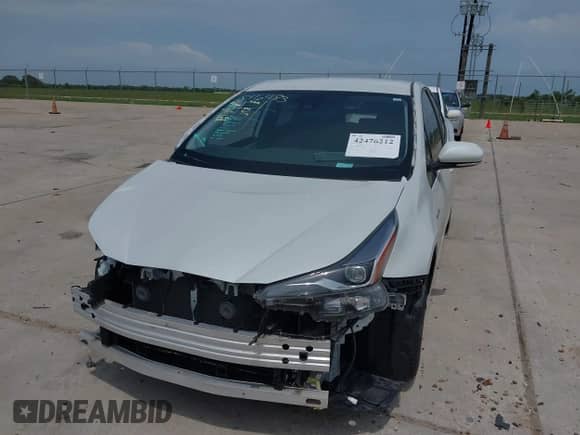 2021 Toyota Prius L Eco with VIN JTDKAMFU9M3136865, listed as a IAAI auction lot 42476212 with 16,961 mi miles and . Bid and sale history available at DreamBid. Image 6.