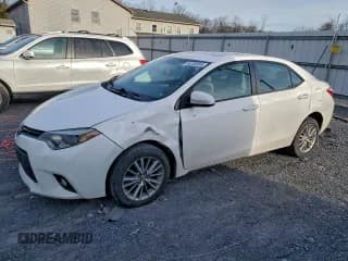✅ 2014 Toyota Corolla LE Plus • VIN: 5YFBURHEXEP000666 • Lot: 94330955. Listed on Copart with 288,999 mi. Free auction sales archive from the USA and detailed vehicle history report at DreamBid. Image 1.