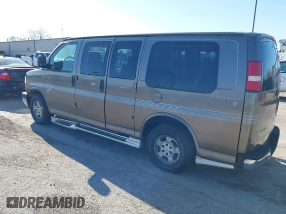 ✅ 2004 Chevrolet Express Passenger • VIN: 1GBFG15T341149179 • Lot: 41964604. Listed on IAAI with 179,725 mi. Free auction sales archive from the USA and detailed vehicle history report at DreamBid. Image 3.