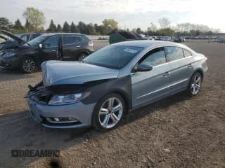 ✅ 2013 Volkswagen CC R-Line • VIN: WVWBN7AN7DE522405 • Lot: 86824715. Listed on Copart with 103,360 mi. Free auction sales archive from the USA and detailed vehicle history report at DreamBid. Image 1.