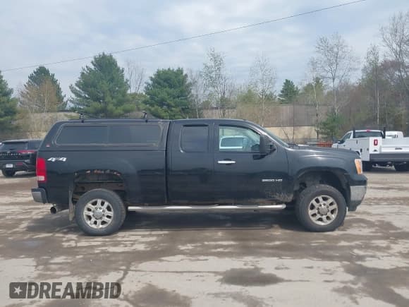 ✅ 2011 GMC Sierra 2500HD Work Truck • VIN: 1GT22ZC82BZ459036 • Lot: 42126973. Listed on IAAI with 122,296 mi. Free auction sales archive from the USA and detailed vehicle history report at DreamBid. Image 13.