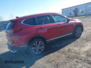 ✅ 2021 Honda CR-V Touring • VIN: 7FART6H9XME003424 • Lot: 42030168. Listed on IAAI with 86,299 mi. Free auction sales archive from the USA and detailed vehicle history report at DreamBid. Image 4.