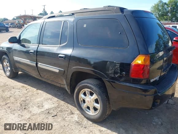 ✅ 2003 GMC Envoy SLT • VIN: 1GKES16S236165956 • Lot: 42602816. Listed on IAAI with 211,268 mi. Free auction sales archive from the USA and detailed vehicle history report at DreamBid. Image 3.
