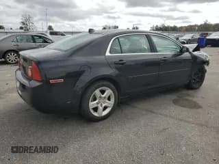 ✅ 2012 Chevrolet Malibu 1LS • VIN: 1G1ZB5E0XCF254137 • Lot: 80110684. Listed on Copart with 136,892 mi. Free auction sales archive from the USA and detailed vehicle history report at DreamBid. Image 3.