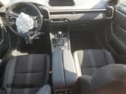 ✅ 2025 Mazda CX-50 S Premium • VIN: 7MMVABDM7SN309319 • Лот: 84549985. Опубликован ранее на Copart с пробегом 9 940 миль. Бесплатный доступ к архиву аукционных продаж из США и подробный отчёт об истории автомобиля на DreamBid. Изображение 8.