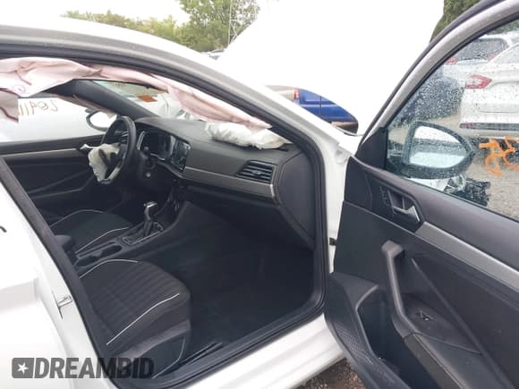 ✅ 2023 Volkswagen Jetta Sport • VIN: 3VWBM7BU8PM023522 • Lot: 43047935. Listed on IAAI with 20,411 mi. Free auction sales archive from the USA and detailed vehicle history report at DreamBid. Image 5.