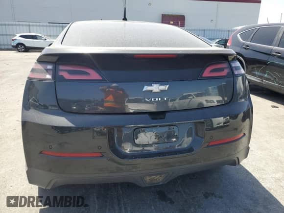 2014 Chevrolet Volt z VIN 1G1RE6E48EU129216, wystawiony jako Copart lot #56718034 z przebiegiem 177 521 mil mil oraz Szkoda całkowita • Salvage title. Historia ofert i sprzedaży dostępna na DreamBid. Obrazek 6.