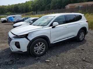 ✅ 2019 Hyundai Santa Fe SEL • VIN: 5NMS3CAD6KH063996 • Lot: 70192314. Wystawiony na Copart z przebiegiem 86 080 mil. Bezpłatny archiwum sprzedaży aukcyjnych z USA i szczegółowy raport historii pojazdu na DreamBid. Zdjęcie 1.