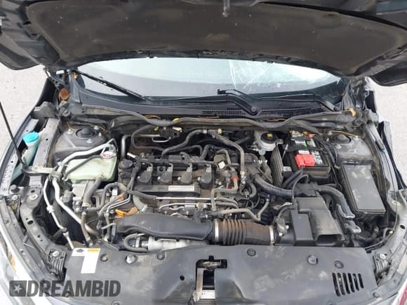 ✅ 2018 Honda Civic EX-T • VIN: JHMFC1F30JX043947 • Lot: 43563584. Listed on IAAI with 145,000 mi. Free auction sales archive from the USA and detailed vehicle history report at DreamBid. Image 10.