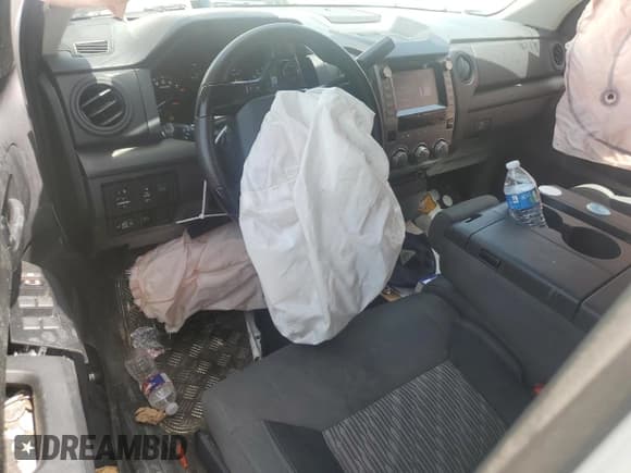 ✅ 2021 Toyota Tundra SR • VIN: 5TFTY5F1XMX011555 • Lot: 65713644. Listed on Copart with 110,914 mi. Free auction sales archive from the USA and detailed vehicle history report at DreamBid. Image 8.