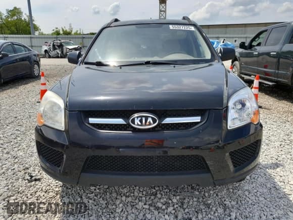 ✅ 2009 Kia Sportage EX • VIN: KNDJF723797626989 • Lot: 55327225. Wystawiony na Copart z przebiegiem 113 828 mil. Bezpłatny archiwum sprzedaży aukcyjnych z USA i szczegółowy raport historii pojazdu na DreamBid. Zdjęcie 5.